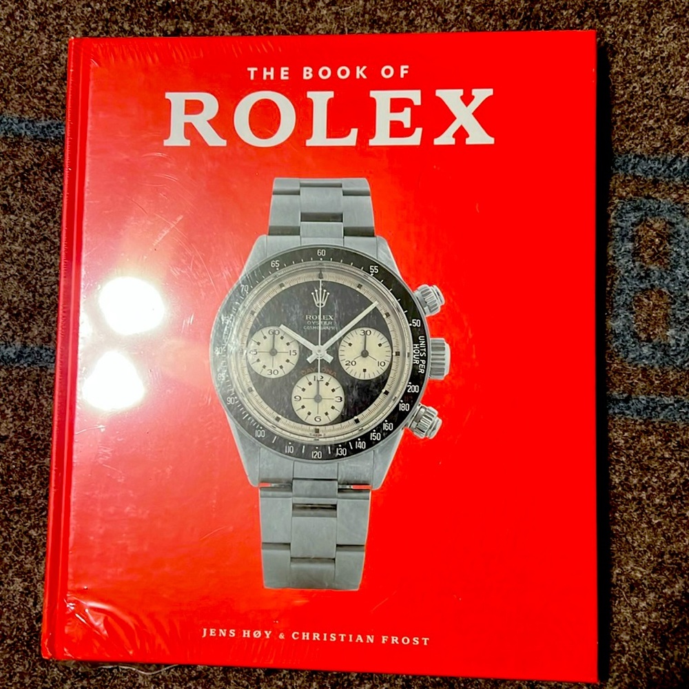 Rolex book new with plastic wrap